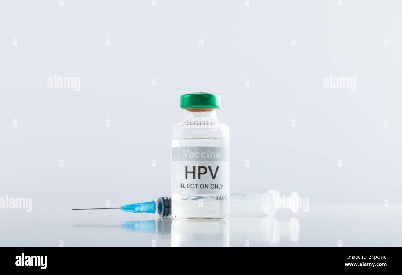 Composition of hpv vaccine vial and syringe on white background with copy space Stock Photo