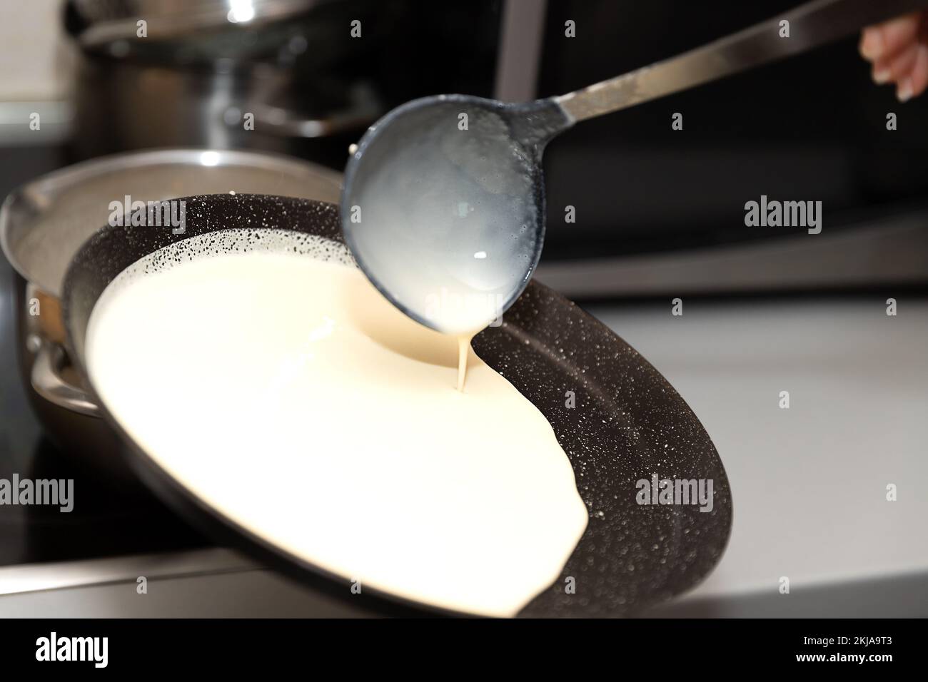 The process of cooking pancakes at home Stock Photo