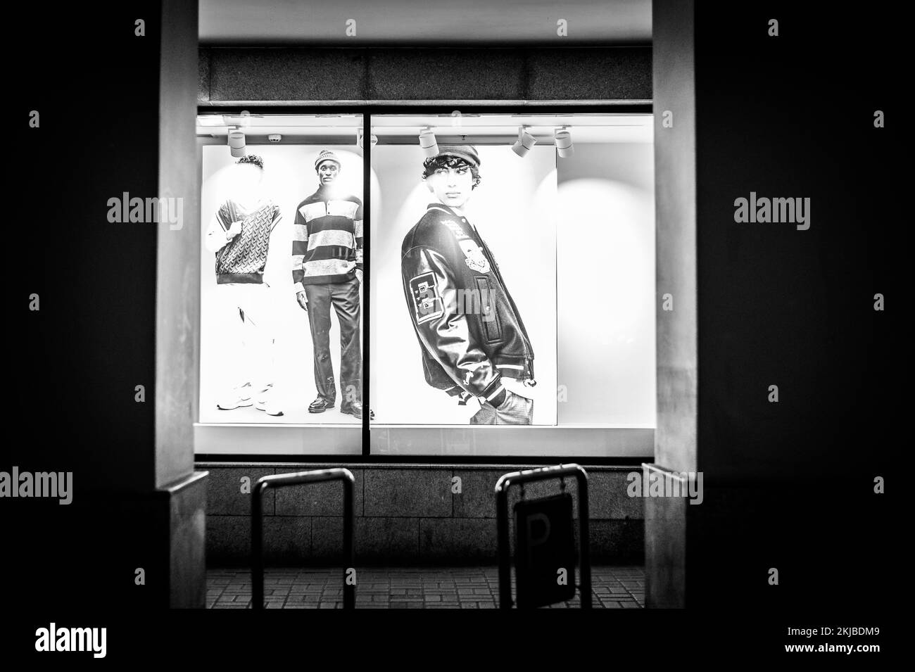 Fashion shop window decoration for cold season. Manikins with warm