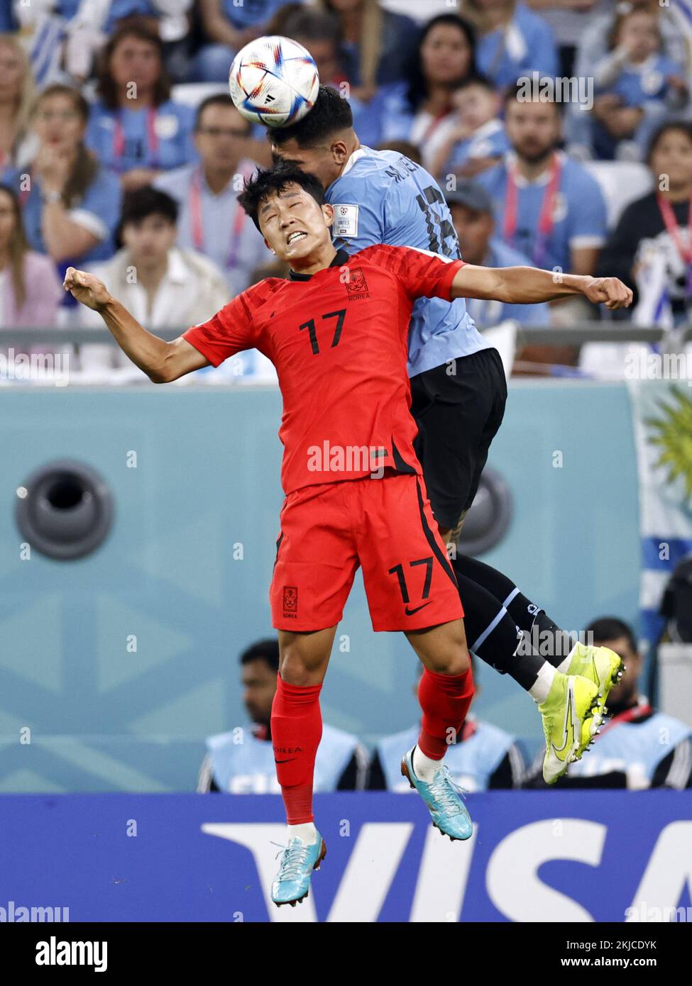 DOHA - (l-r) Sang-ho Na of Korea Republic, Mathias Olivera of Uruguay during the FIFA World Cup Qatar 2022 group H match between Uruguay and South Korea at Education City Stadium on November 24, 2022 in Doha, Qatar. AP | Dutch Height | MAURICE OF STONE Credit: ANP/Alamy Live News Stock Photo