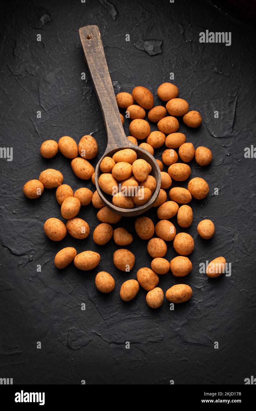 Organic Japanese peanuts in the spoon Arachis hypogaea Stock Photo