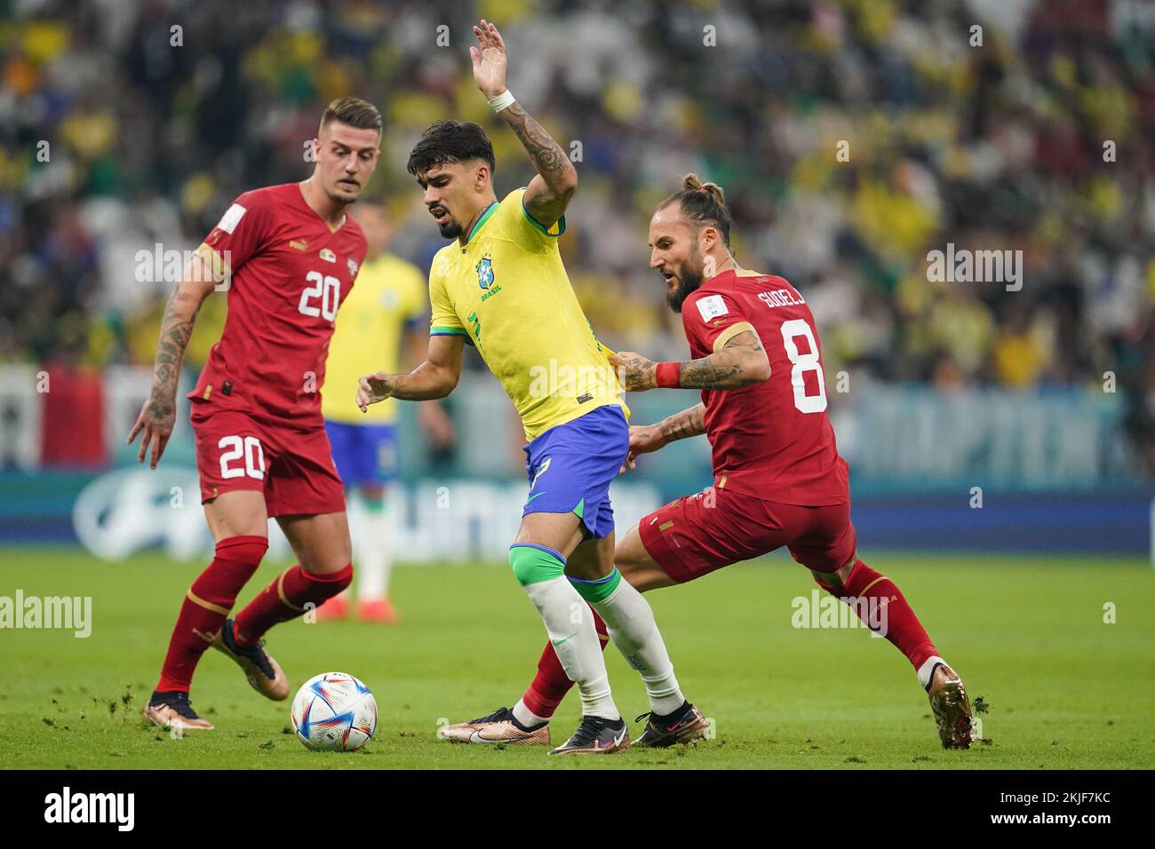 LUSAIL, QATAR - NOVEMBER 24: Player of Brazil Lucas Paquetá fights for the ball with player of Serbia Nemanja Gudelj during the FIFA World Cup Qatar 2022 group G match between Brazil and Serbia at Lusail Stadium on November 24, 2022 in Lusail, Qatar. (Photo by Florencia Tan Jun/PxImages) Credit: Px Images/Alamy Live News Stock Photo