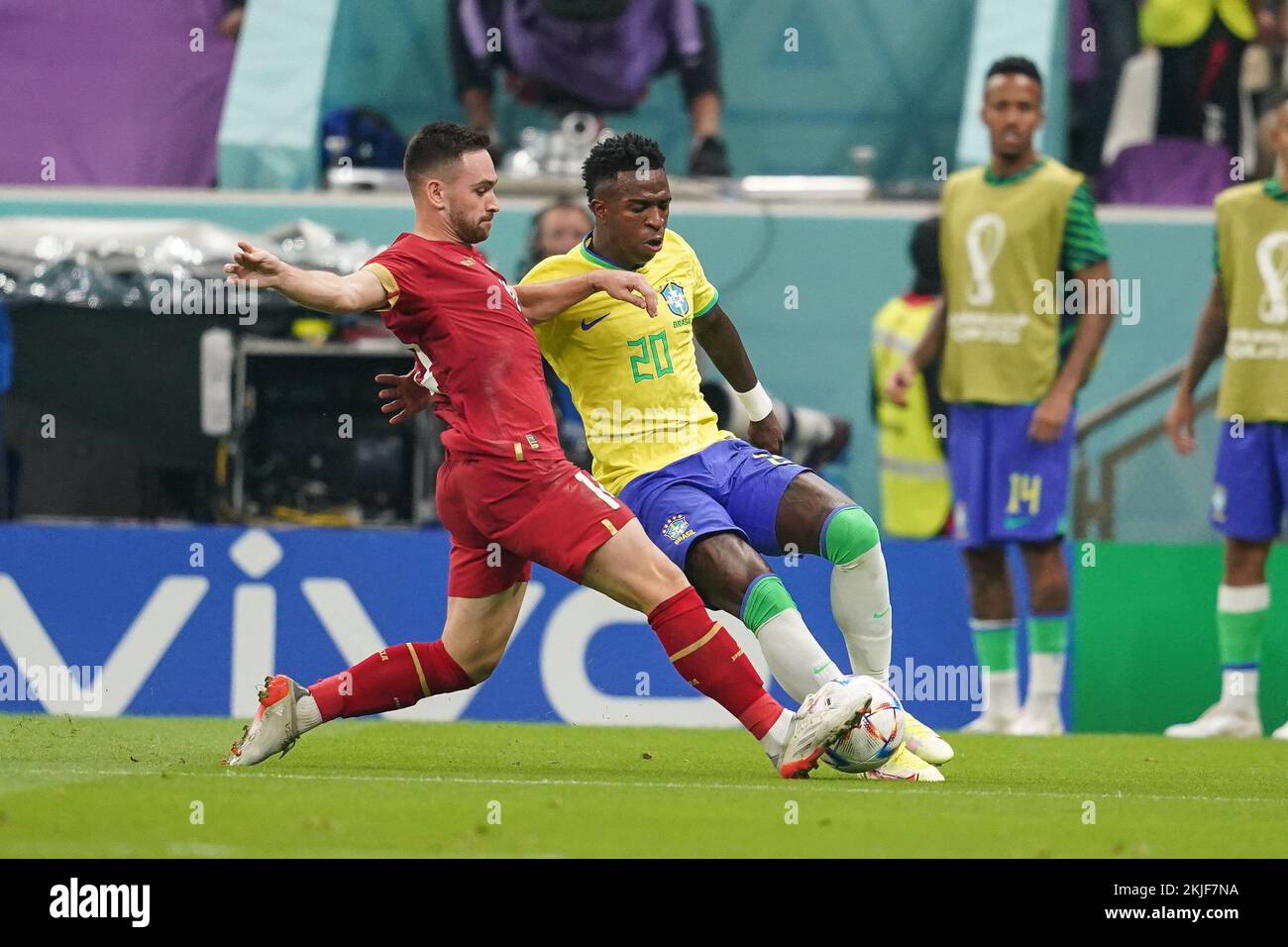 LUSAIL, QATAR - NOVEMBER 24: Player of Brazil Vinícius Júnior fights for the ball with player of Serbia during the FIFA World Cup Qatar 2022 group G match between Brazil and Serbia at Lusail Stadium on November 24, 2022 in Lusail, Qatar. (Photo by Florencia Tan Jun/PxImages) Credit: Px Images/Alamy Live News Stock Photo