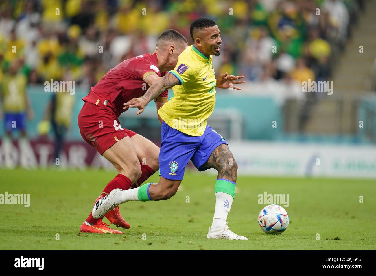 LUSAIL, QATAR - NOVEMBER 24: Player of Brazil Gabriel Jesus fights for the ball with player of Serbia Nikola Milenkovic during the FIFA World Cup Qatar 2022 group G match between Brazil and Serbia at Lusail Stadium on November 24, 2022 in Lusail, Qatar. (Photo by Florencia Tan Jun/PxImages) Credit: Px Images/Alamy Live News Stock Photo