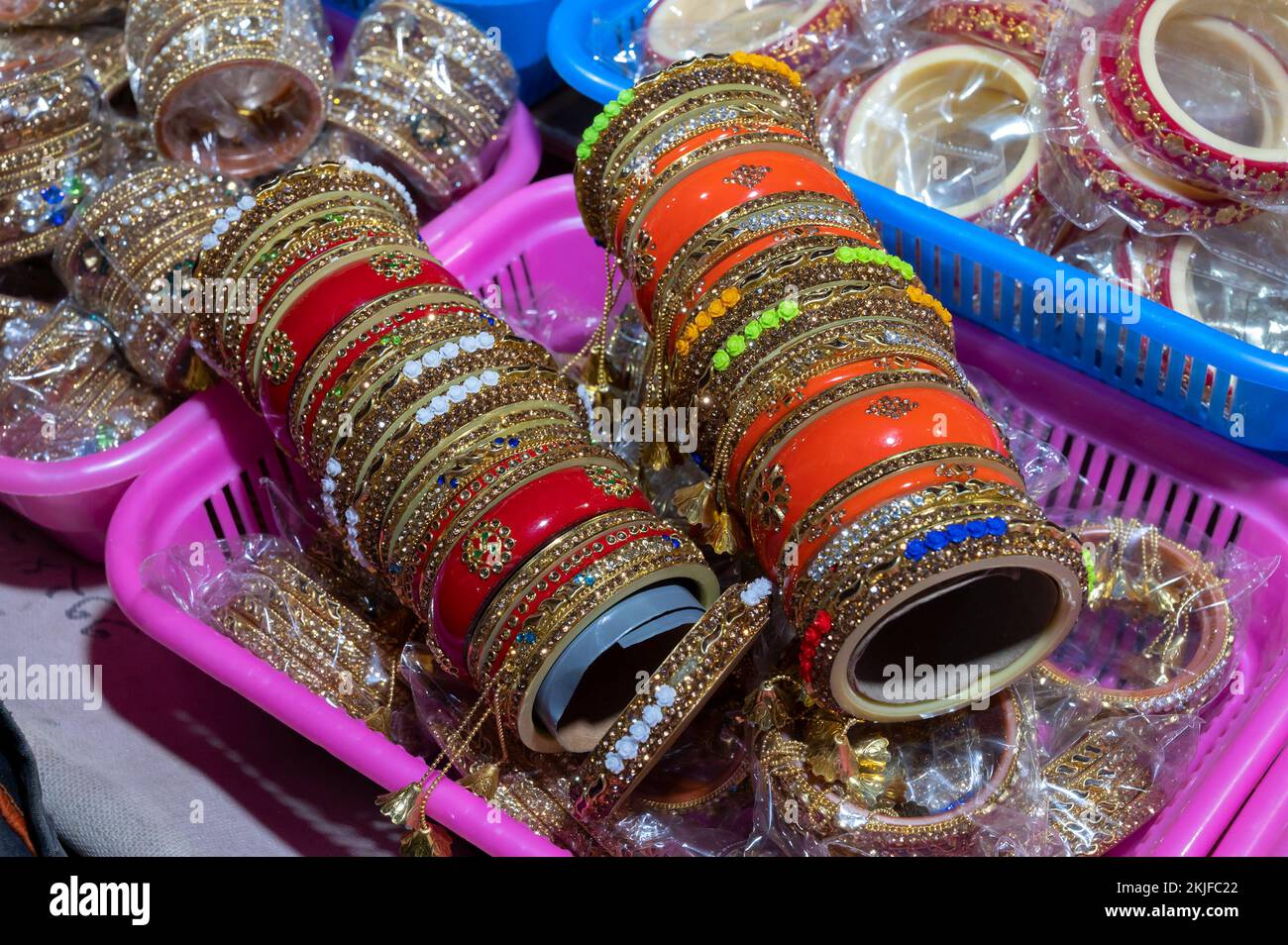 Ornamental bangles being sold at famous Sardar Market and Ghanta ghar Clock tower in Jodhpur, Rajasthan, India. Stock Photo