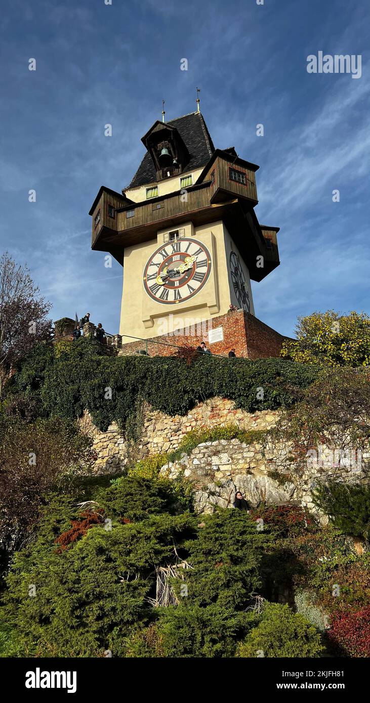 The clock tower - Uhrturm in Graz, Austria, Famous historic structure on summer day Stock Photo