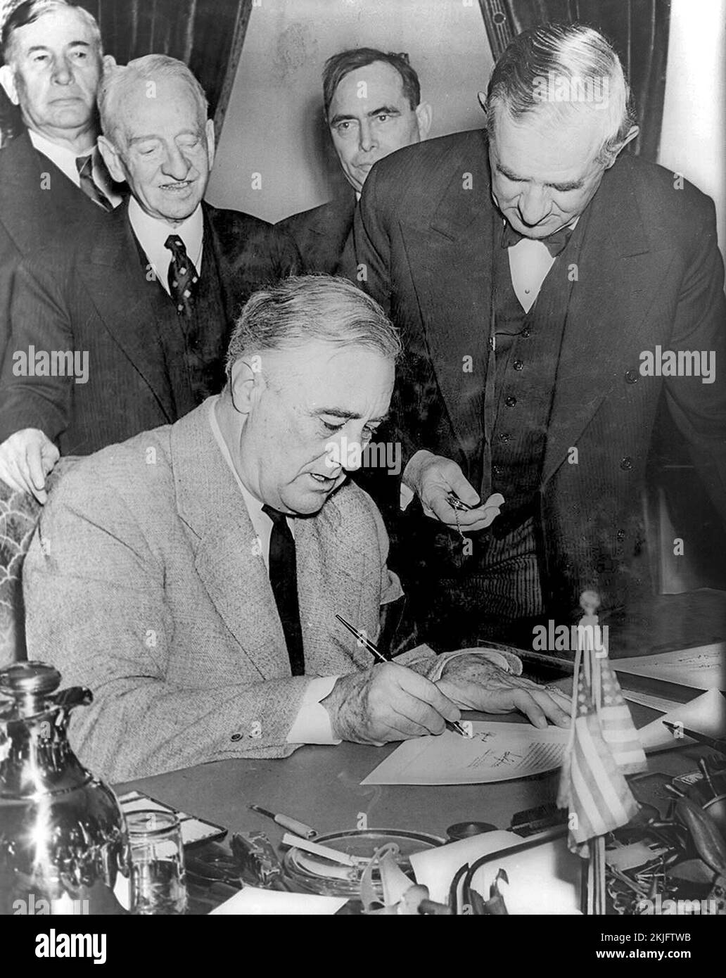 US President Franklin Roosevelt signing the declaration of war against Germany on December 11, 1941 Stock Photo