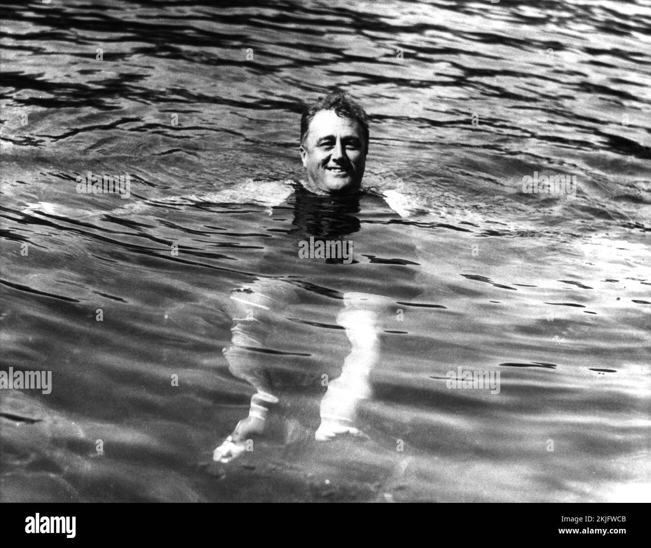 US President Franklin Roosevelt bathing at Warm Springs in Georgia where he went for physiotherapy and hydrotherapy. Photo credit  https://commons.wikimedia.org/w/index.php?curid=43558708 Stock Photo