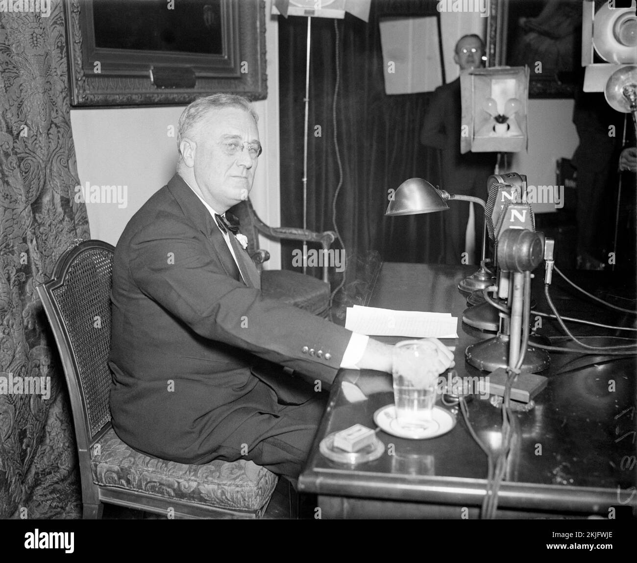 US President Franklin D Roosevelt giving his Fireside Chat on the the establishment of the work relief program and Social Security on April 28, 1935. Stock Photo
