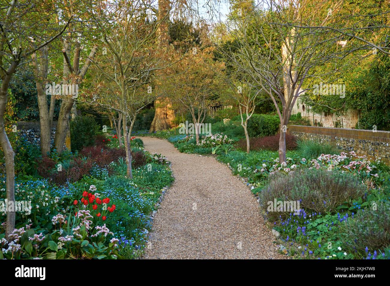 Entrance pathway to Bridge End Garden in Saffron Walden with a gravel