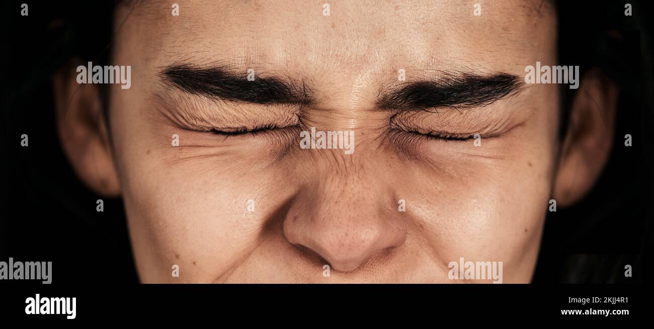 Stress, fear and woman in studio for mental health problem, phobia and anxiety on black