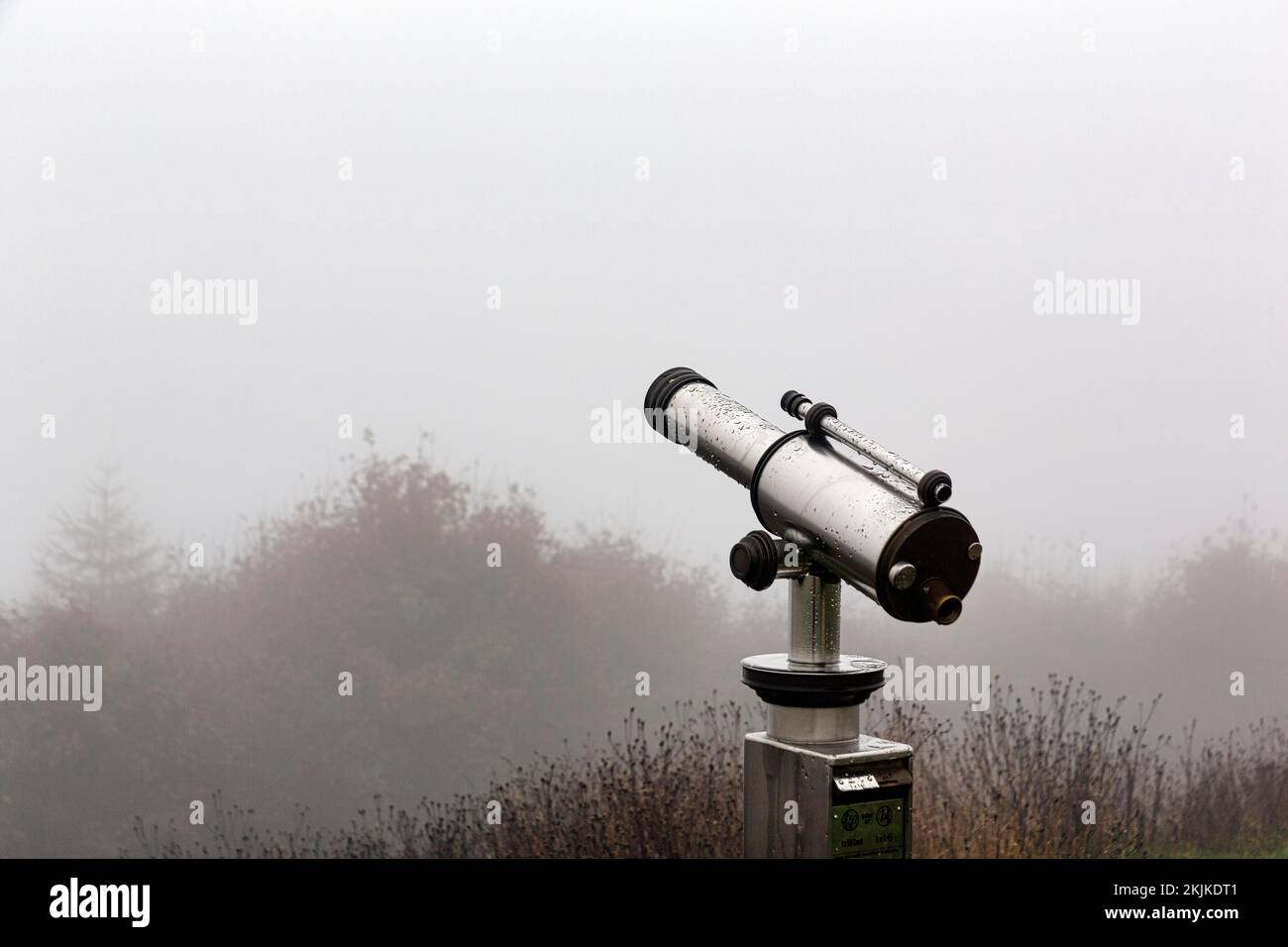 Rain-soaked telescope on mountain top, dreary autumn weather with fog, Köterberg, Lügde, Weserbergland, North Rhine-Westphalia, Germany, Europe Stock Photo
