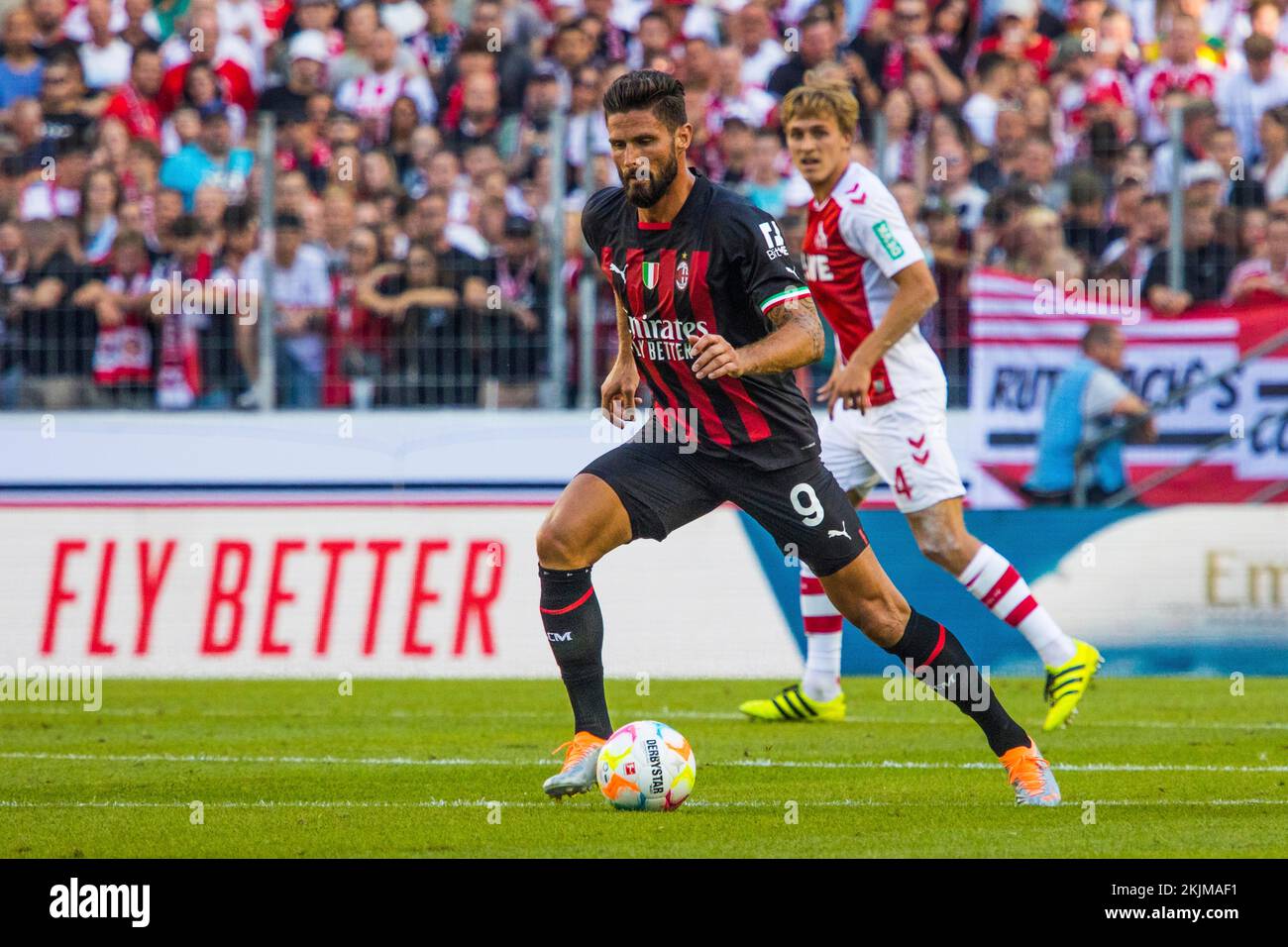 Pictured: Olivier Giroud models AC Milan 2023-24 home kit - Sports Mole