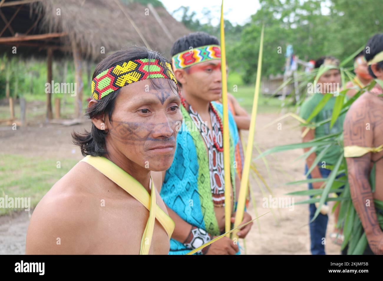 Indigenous people, Huni Kuin men decorated with plant leaves during a traditional ritual in their village in the Amazon rainforest, Acre, Brazil, Sout Stock Photo