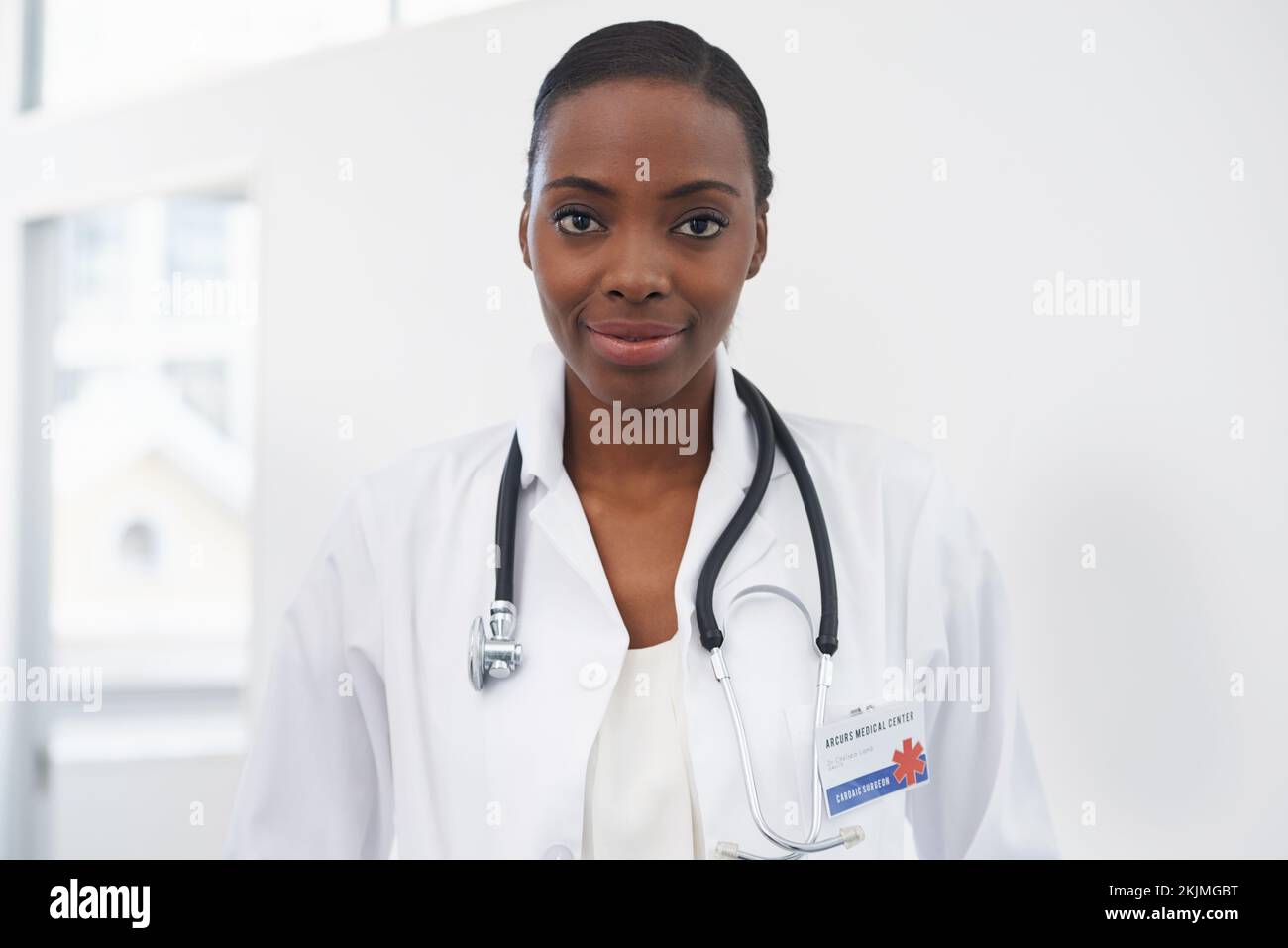 Shes dedicate to advancing medicine. Portrait of a female doctor standing in a room. Stock Photo
