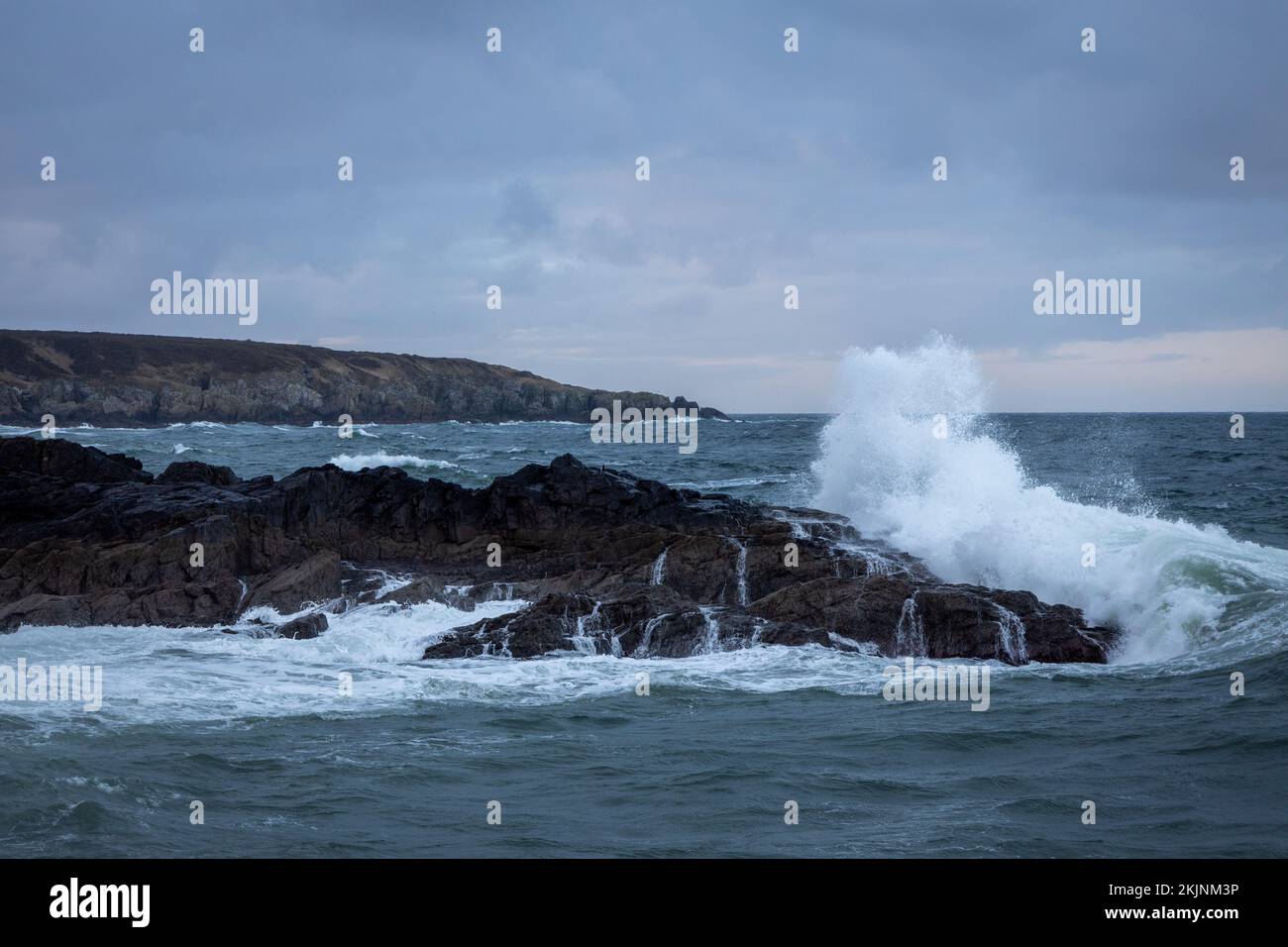 An aerial view of sea waves breaking rocky beach Stock Photo - Alamy