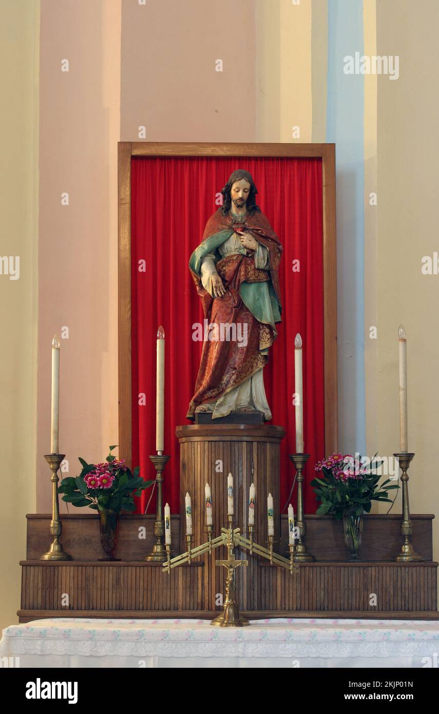 Altar of the Sacred Heart of Jesus in the parish church of Wounded Jesus in Gradec, Croatia Stock Photo