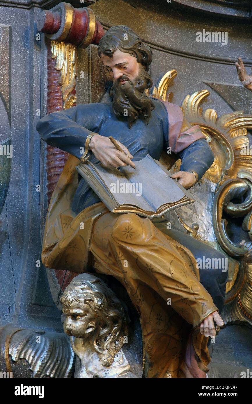 Saint Mark, statue on the pulpit in the parish church of Our Lady of Snow in Kutina, Croatia Stock Photo