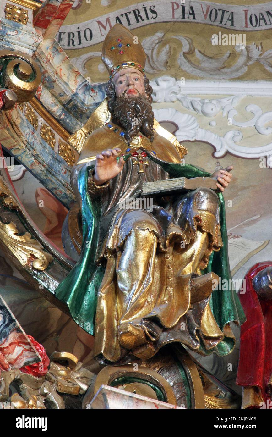 Saint Augustine, statue on the main altar in the parish church of Our Lady of the Snow in Kutina, Croatia Stock Photo