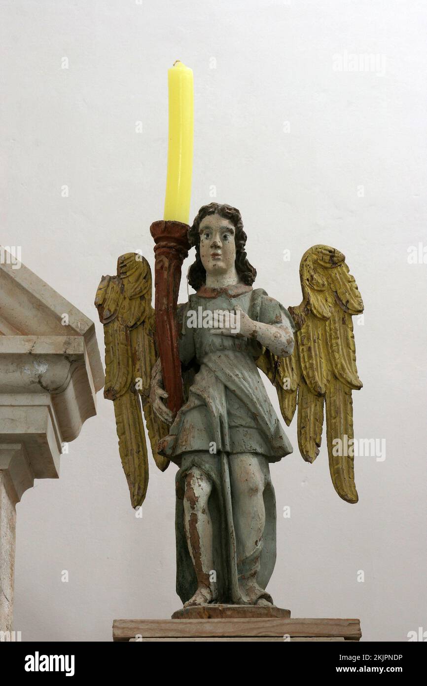Angel, statue on the main altar in the parish church of St. Roch in ...