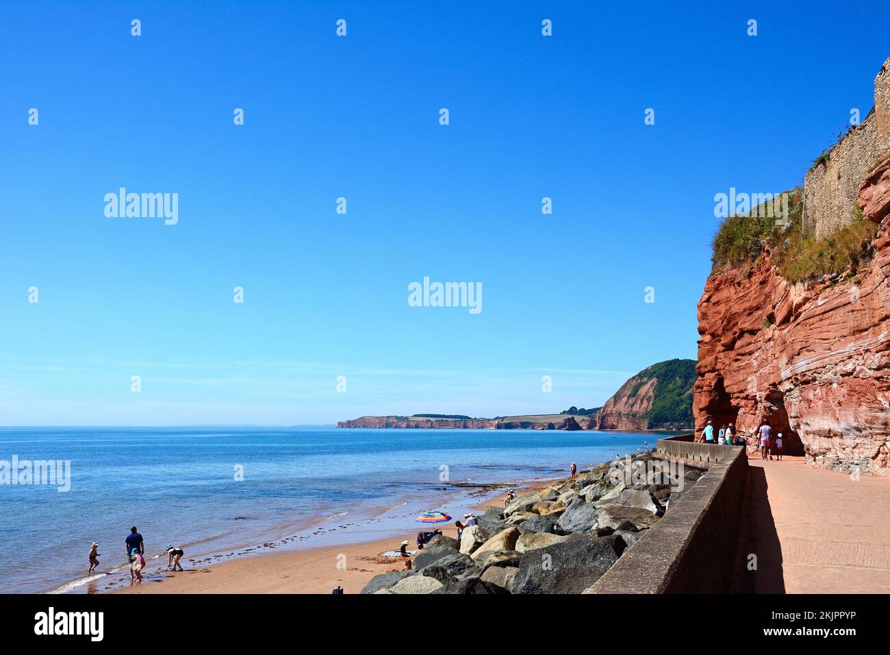 View along the sandy beach towards the cliffs, Sidmouth, Devon, UK, Europe. Stock Photo