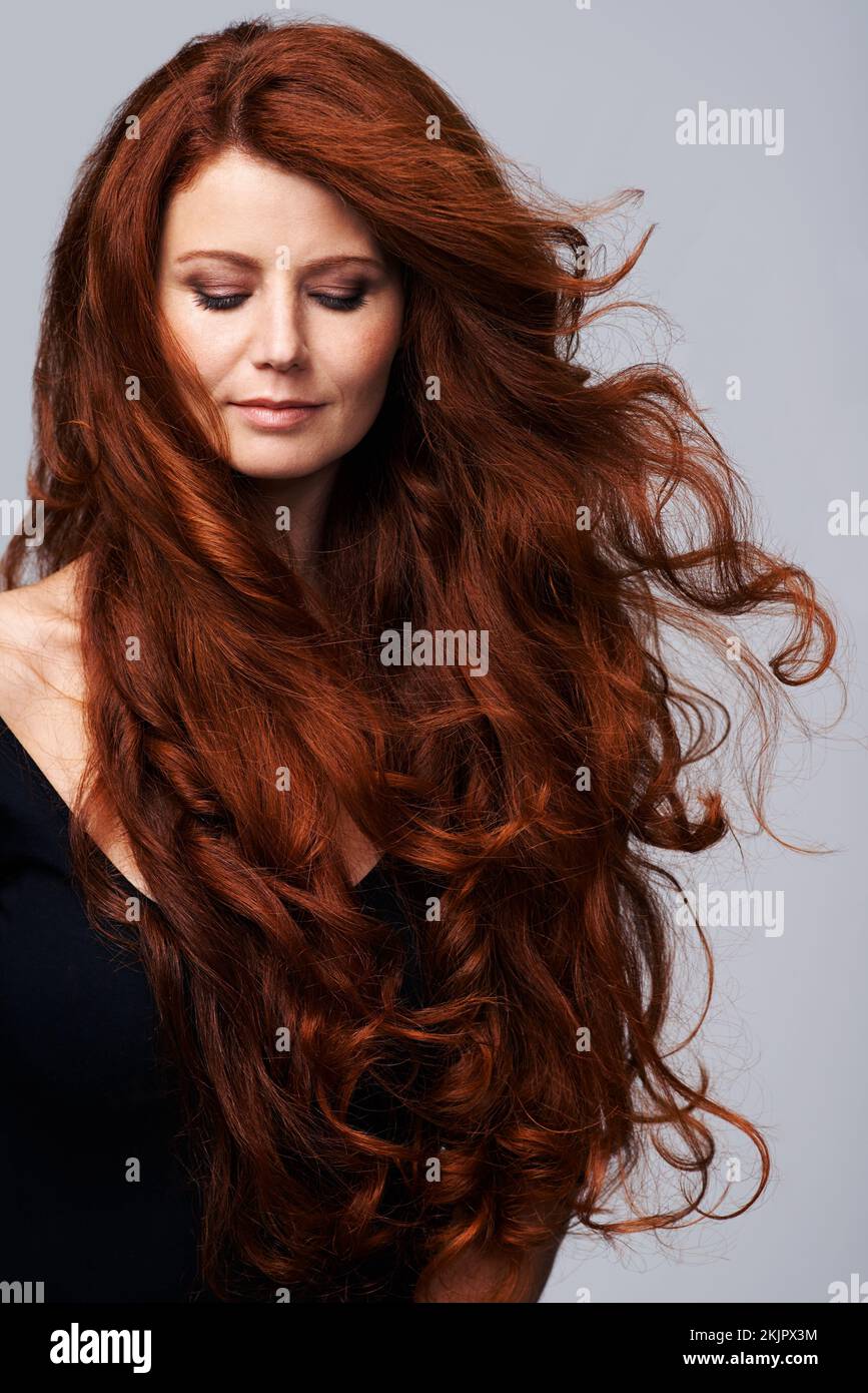 Woman long curly hair blowing hi-res stock photography and images - Alamy