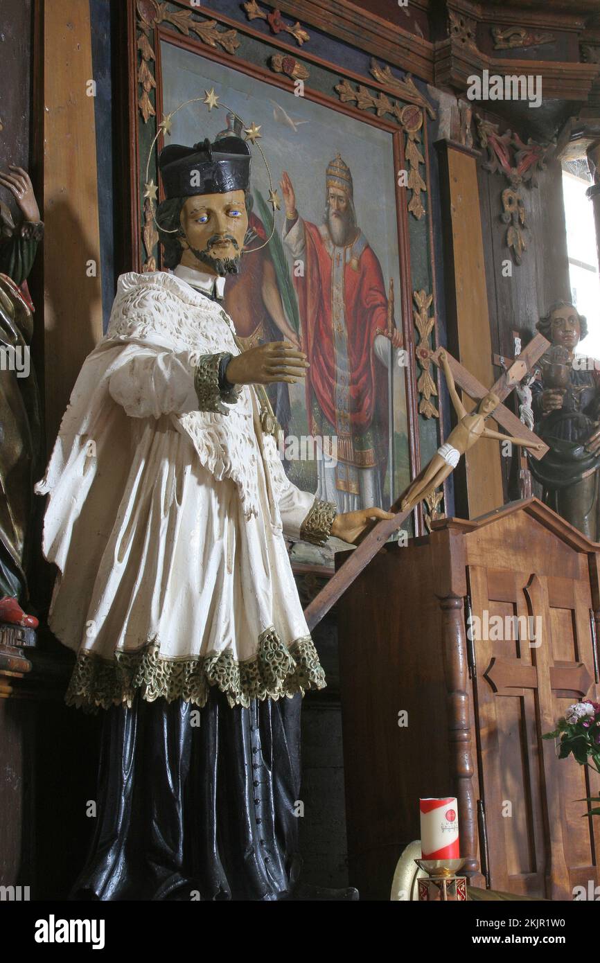 St. John of Nepomuk, statue on the Altar of Saints Fabian and Sebastian in the Parish Church of the Assumption of the Virgin Mary in Gornja Rijeka, Cr Stock Photo