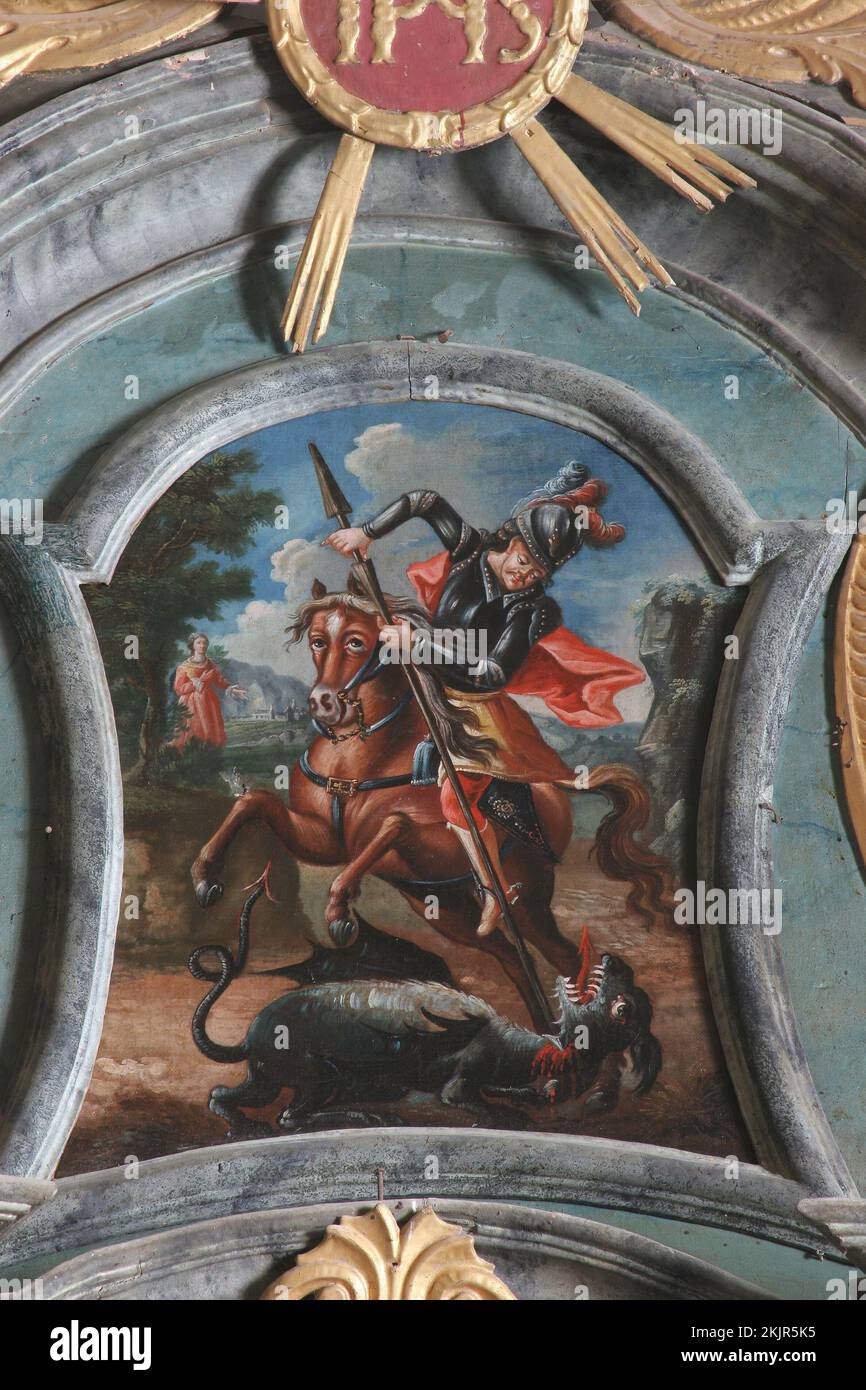 Saint George kills the dragon, painting on the altar of the Passion of Jesus in the parish church of Saint Nicholas in Hrascina, Croatia Stock Photo