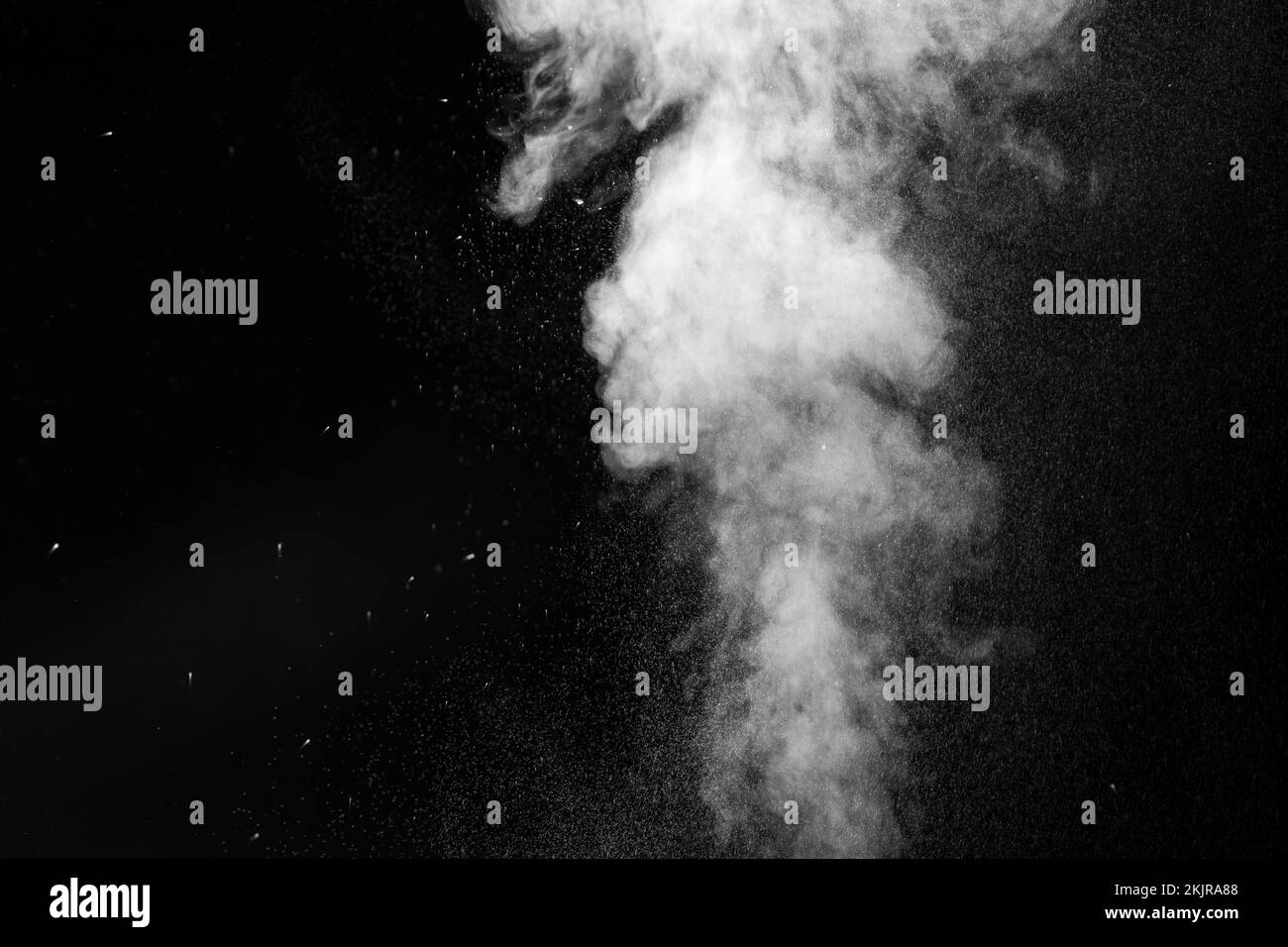 the movement of hot steam with water droplets is isolated on a black background to overlay your photos. Steam background, abstract smoke on a black ba Stock Photo