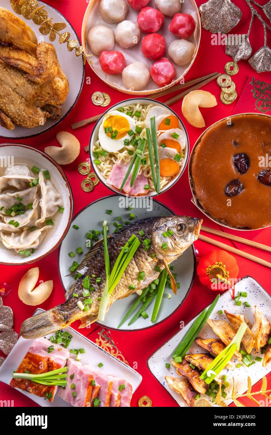 Traditional Chinese lunar New Year dinner table, party invitation, menu