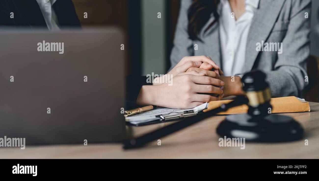 Justice and attorney concept. Lawyer meeting and consoling solution to his client provide legal advice and trust commitment strain serious for problem Stock Photo