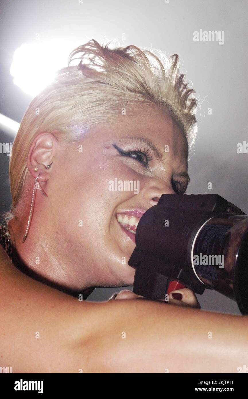 Pink (P!nk) playing live at the BBC Radio One Live exclusive tent arena event in Coopers Field in Cardiff, Wales, UK on September 14 2003. Photograph: ROB WATKINS Stock Photo