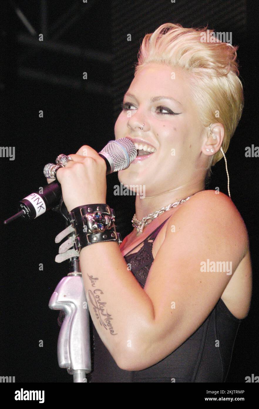 Pink (P!nk) playing live at the BBC Radio One Live exclusive tent arena event in Coopers Field in Cardiff, Wales, UK on September 14 2003. Photograph: ROB WATKINS Stock Photo