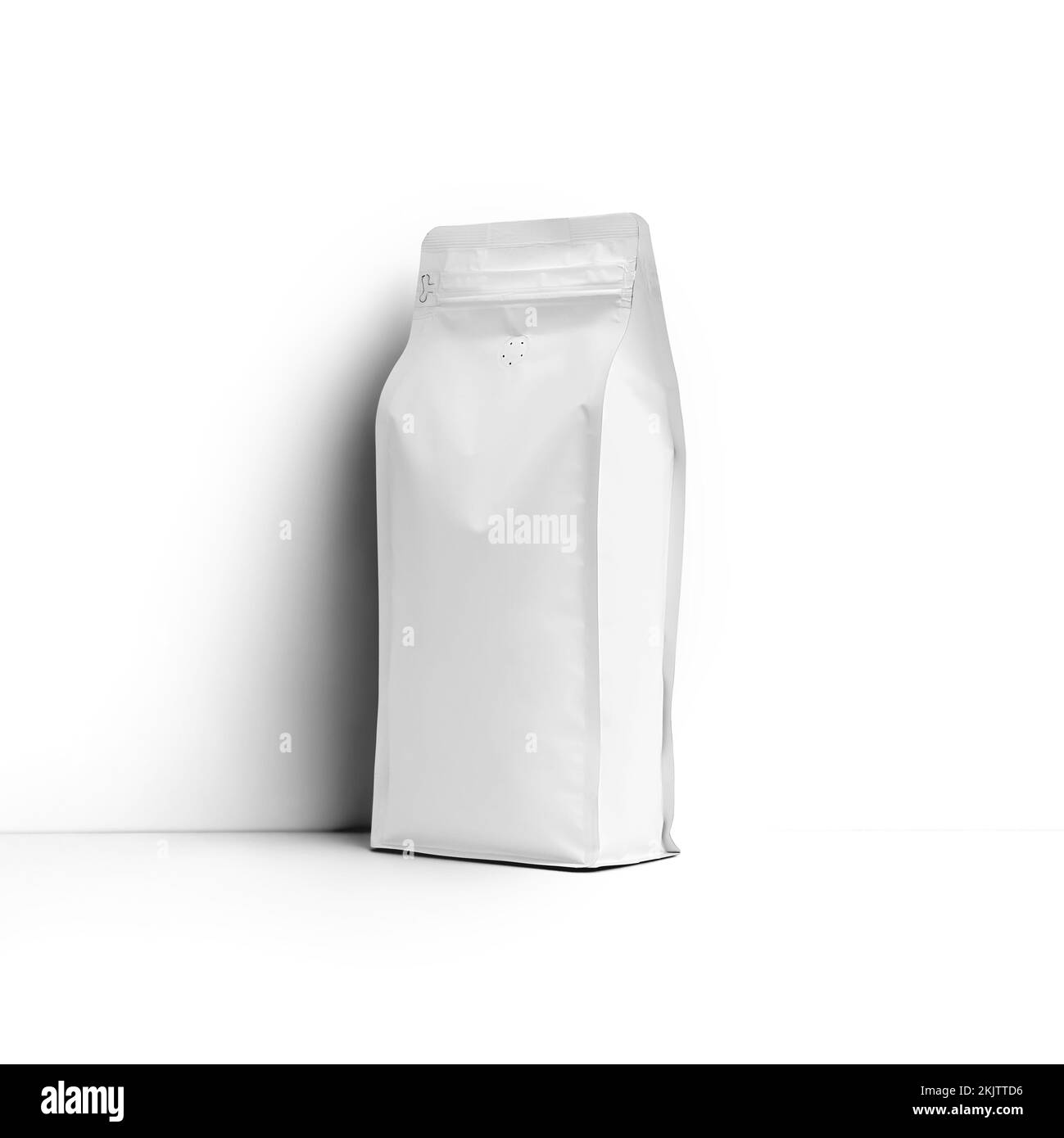 Mockup of a white stable bag for coffee beans, packaging with a degassing valve, front, side space for design, branding. Pack template for loose tea, Stock Photo