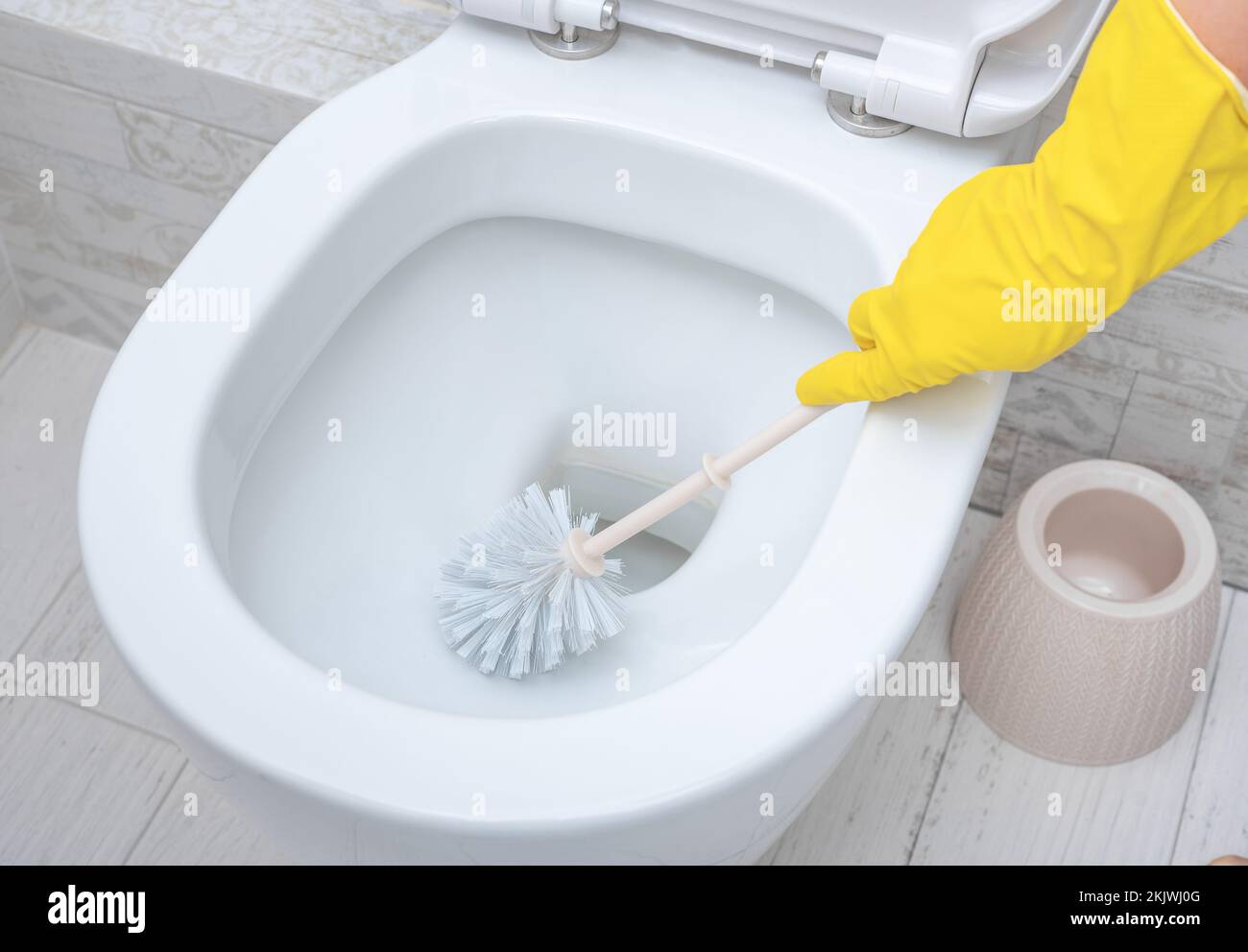 Deep Cleaning service. cleaning wc. Professional cleaner washing toilet ...
