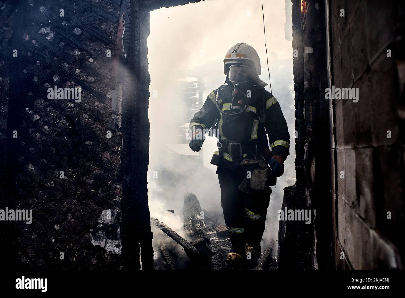 Antonin Burat / Le Pictorium -  War in Ukraine: David stands up to Goliath -  23/3/2022  -  Ukraine / Kyiv  -  Firefighters battling a fire in a build Stock Photo