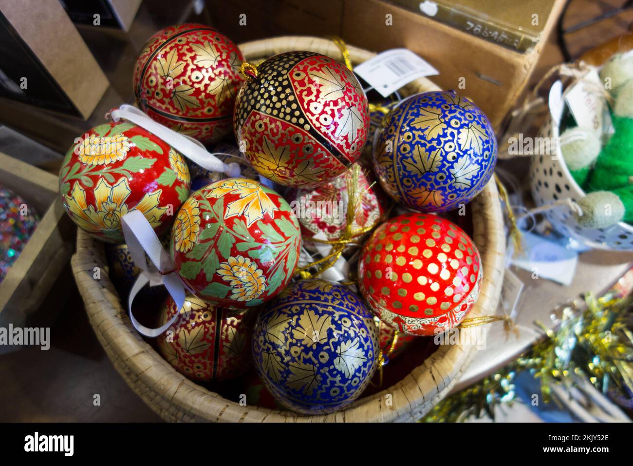Closeup of colourful Christmas decorations and baubles in a shop Stock Photo
