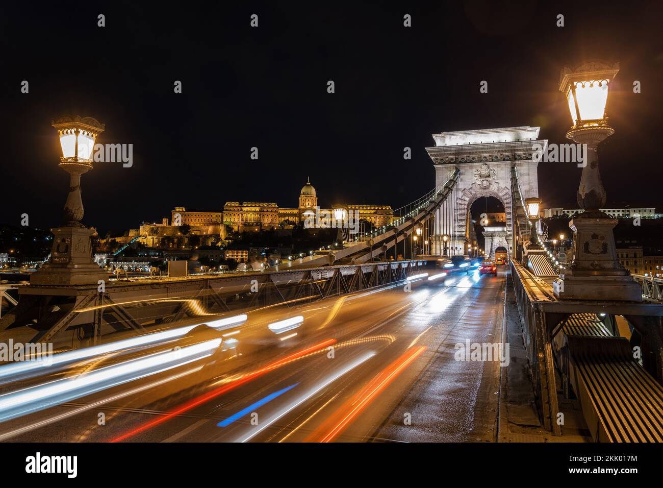 Budapest, Hungary, historic landmark Szechenyi Chain Bridge with Buda Castle in the background. Stock Photo