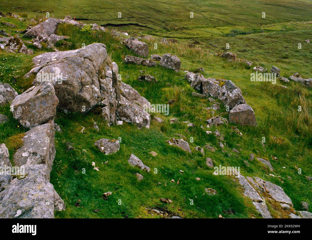 Dun Gerashader Iron Age promontory enclosure, Isle of Skye, Scotland, UK, looking E over lines of boulders defending the S approach. Stock Photo