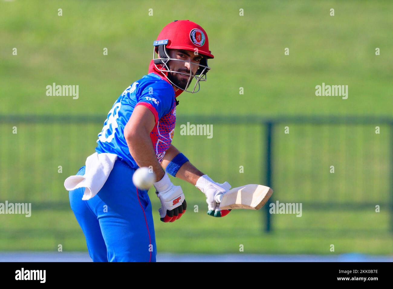 Kandy, Sri Lanka. 25th November 2022. Afghanistan's Ibrahim Zadran watches the ball after