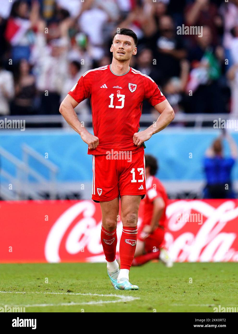 Wales' Kieffer Moore appears dejected after Iran's Roozbeh Cheshmi (not pictured) scores their side's first goal of the game during the FIFA World Cup Group B match at the Ahmad Bin Ali Stadium, Al-Rayyan. Picture date: Friday November 25, 2022. Stock Photo