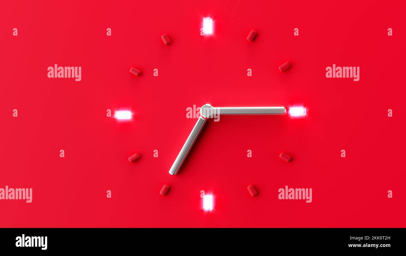 A red clock silver needle isolated on a red background Stock Photo