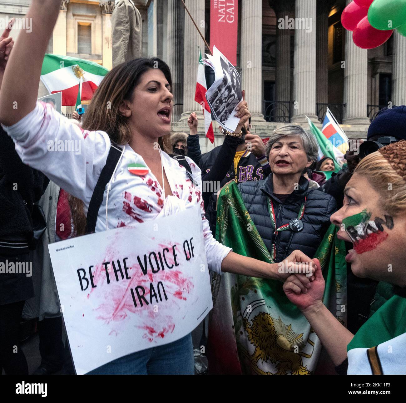 Iranians living in England protesting against the Islamic Republic in Iran. They are support ing the Womens uprising against repressive rule on wearin Stock Photo