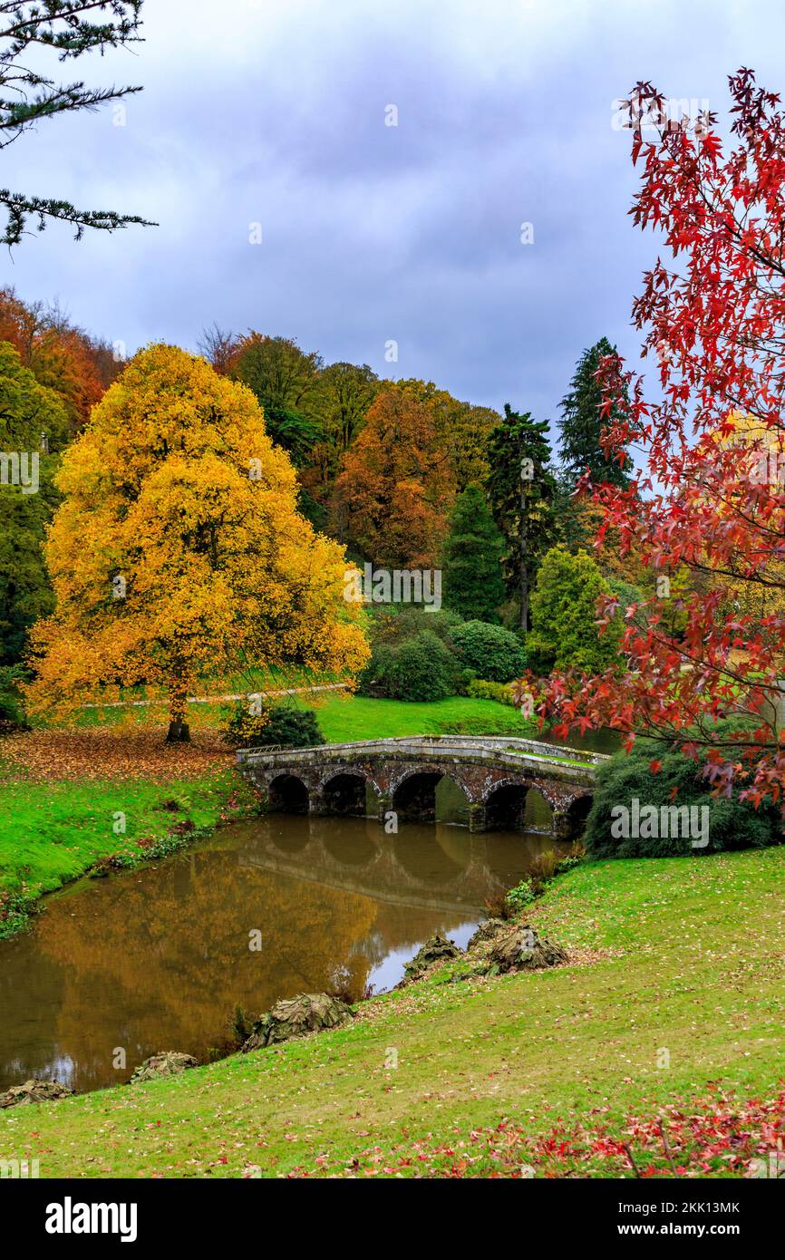 Spectacular autumn colour surrounds the historic Palladian bridge at