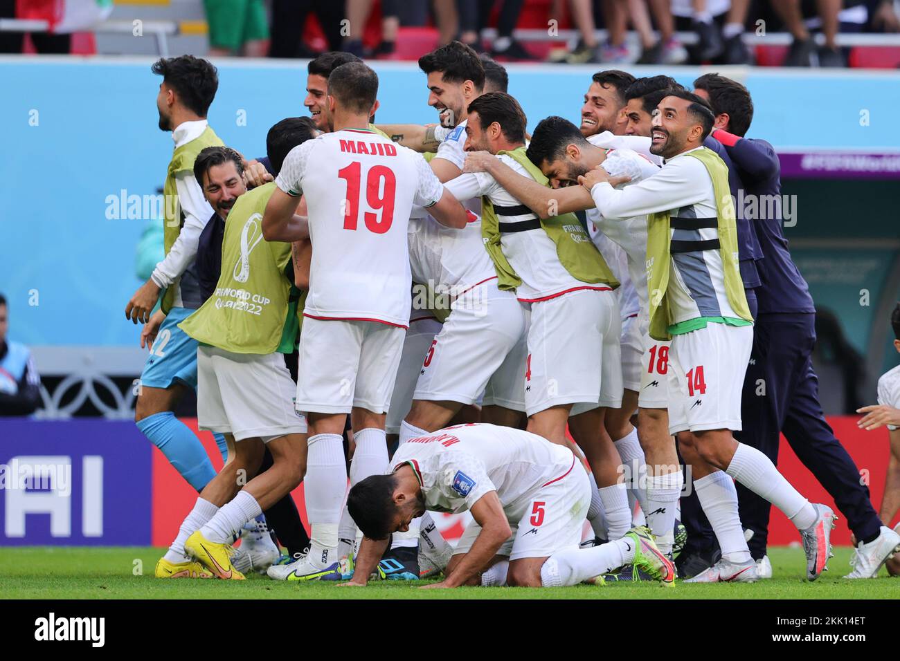 Doha, Qatar. 25th Nov, 2022. Iran players celebrate last minute goal to Rouzbeh Cheshmi of Iranduring the FIFA World Cup Qatar 2022 Group B match between Wales and Iran at the Ahmad Bin Ali Stadium, Doha, Qatar on 25 November 2022. Photo by Peter Dovgan. Editorial use only, license required for commercial use. No use in betting, games or a single club/league/player publications. Credit: UK Sports Pics Ltd/Alamy Live News Credit: UK Sports Pics Ltd/Alamy Live News Stock Photo