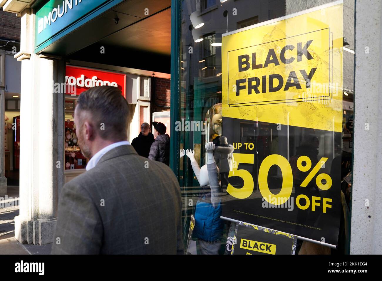 Shoppers on Winchester's High Street on Black Friday. Picture date: Friday November 25, 2022. Stock Photo