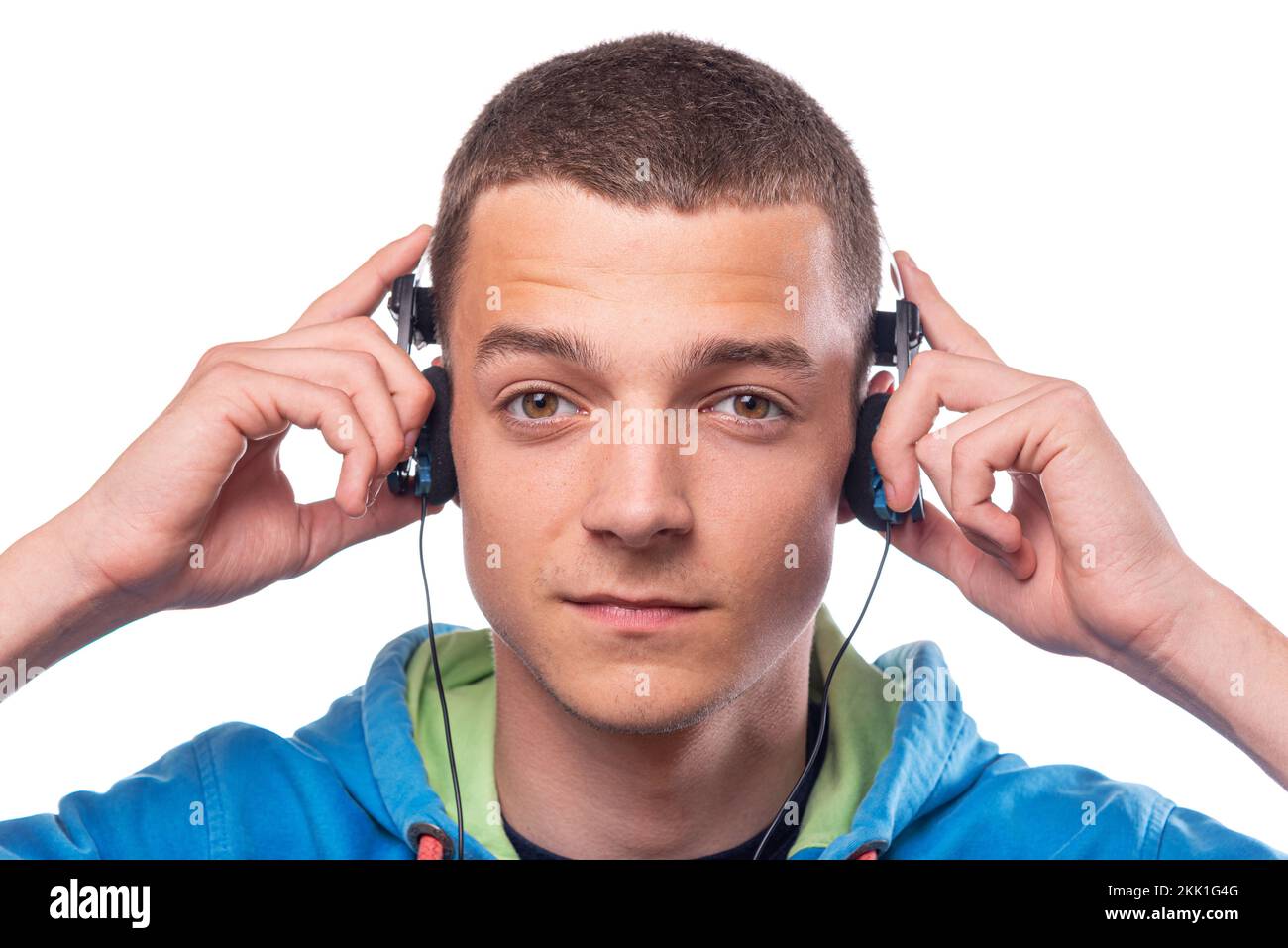 young-guy-in-headphones-on-a-white-background-stock-photo-alamy