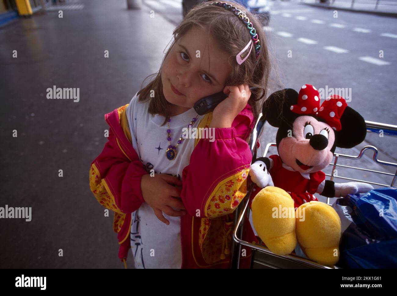 Paris France Orly Airport Child Using Mobile Phone Minnie Mouse Stock Photo