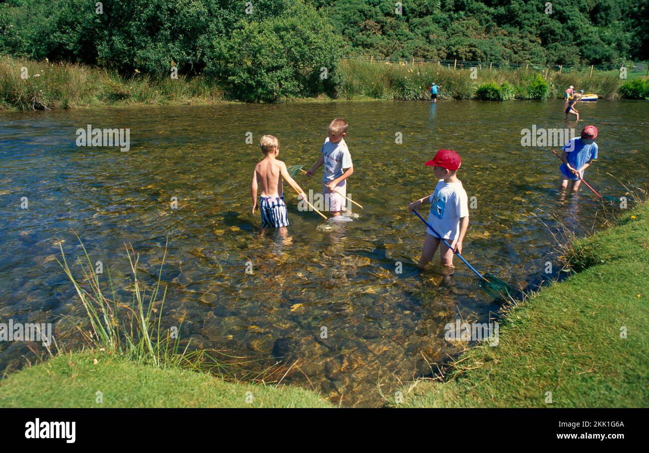 Somerset England River Exmoor Boys Fishing In River Stock Photo