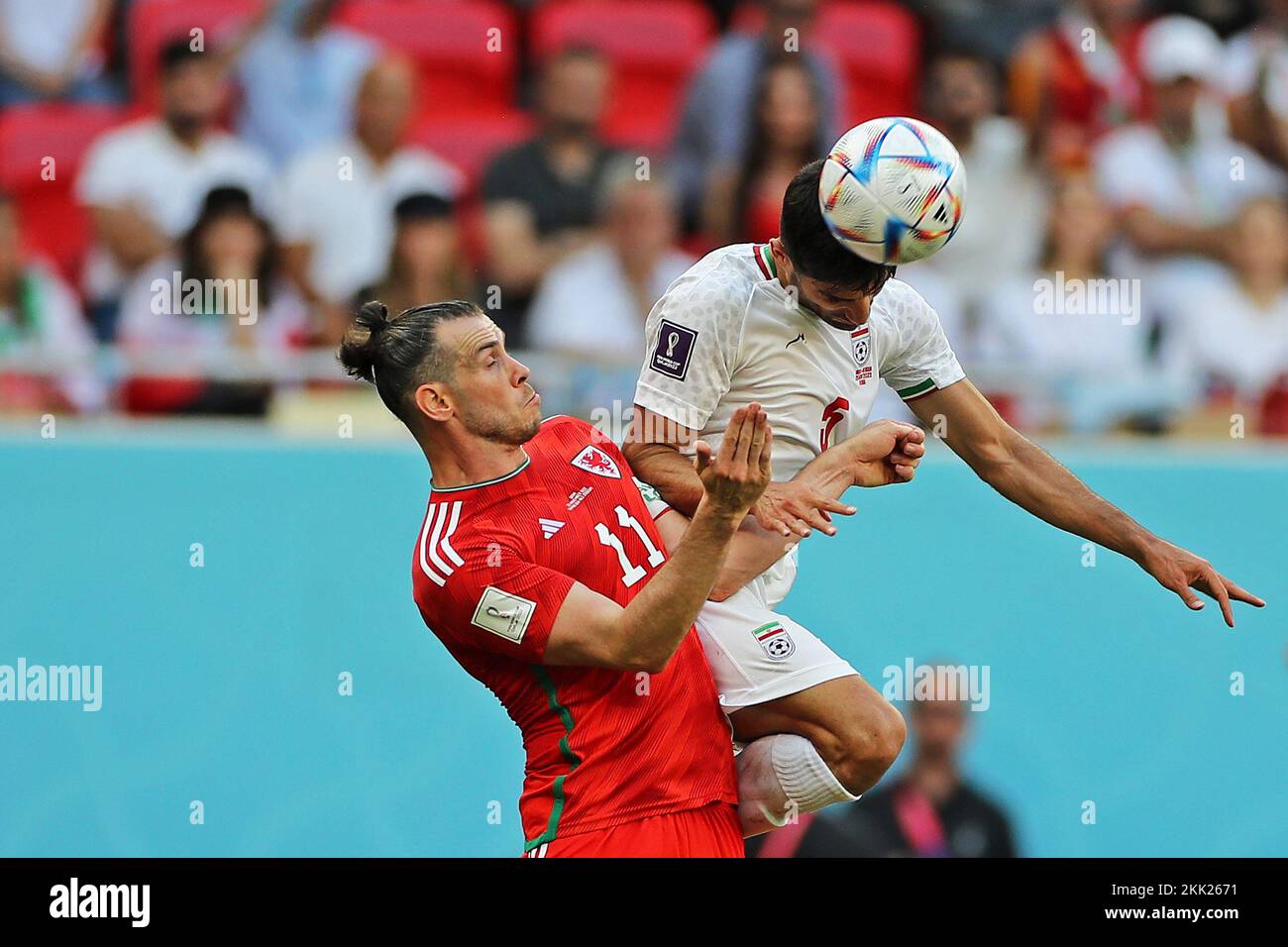 Doha, Qatar. 25th Nov, 2022. Gareth Bale of Wales disputes the bid with Milad Mohammadi of Iran, during the match between Wales and Iran, for the 2nd round of Group B of the FIFA World Cup Qatar 2022, Ahmed bin Ali Stadium this Friday 25. 30761 (Heuler Andrey/SPP) Credit: SPP Sport Press Photo. /Alamy Live News Stock Photo